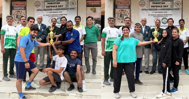 Karachi: Chief guest Ahmed Ali Rajput is giving away the winning trophy to the winning teams at the closing ceremony of the Defence Day Sepaktakraw Championship. Mehfoozul Haq, Noushad Ahmed Khan, Dr. Arif Hafeez, Shabbir Ahmed and Dilip Kumar are also present.