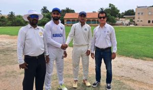 Karachi: Group photo of Al-Karam Sports captain Aurangzeb Ahmed and Munawar Sports captain Roman Ali along with Zone One Secretary Arif Waheed during the toss before the match